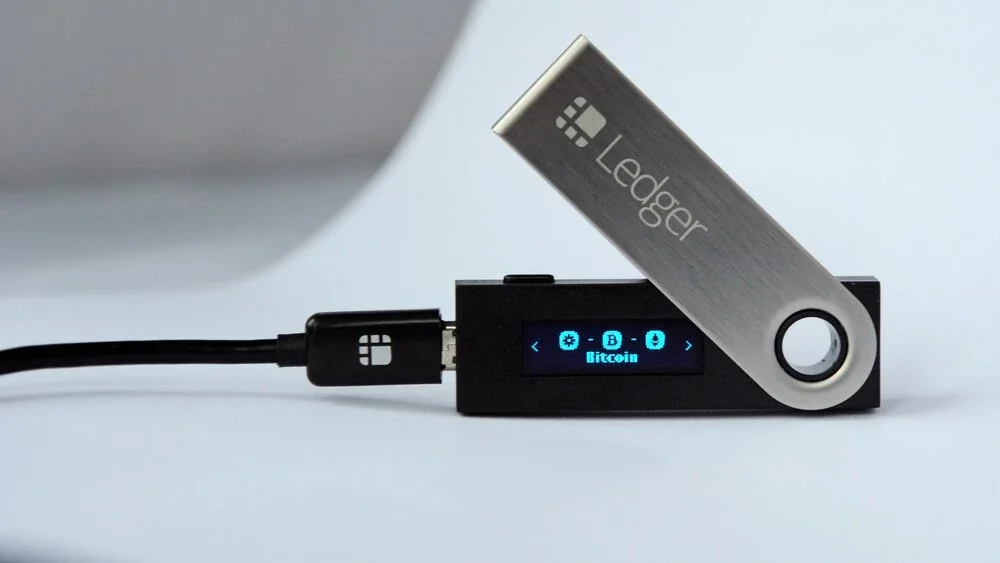 USB cord connected to a ledger wallet