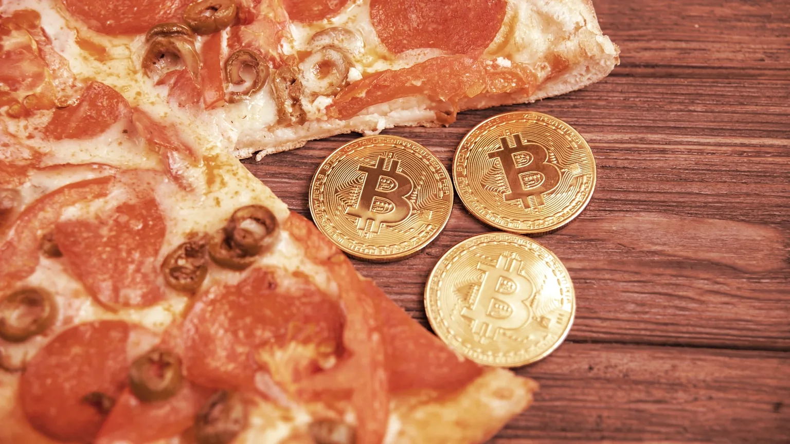 Bitcoin and pizza. Image: Shutterstock
