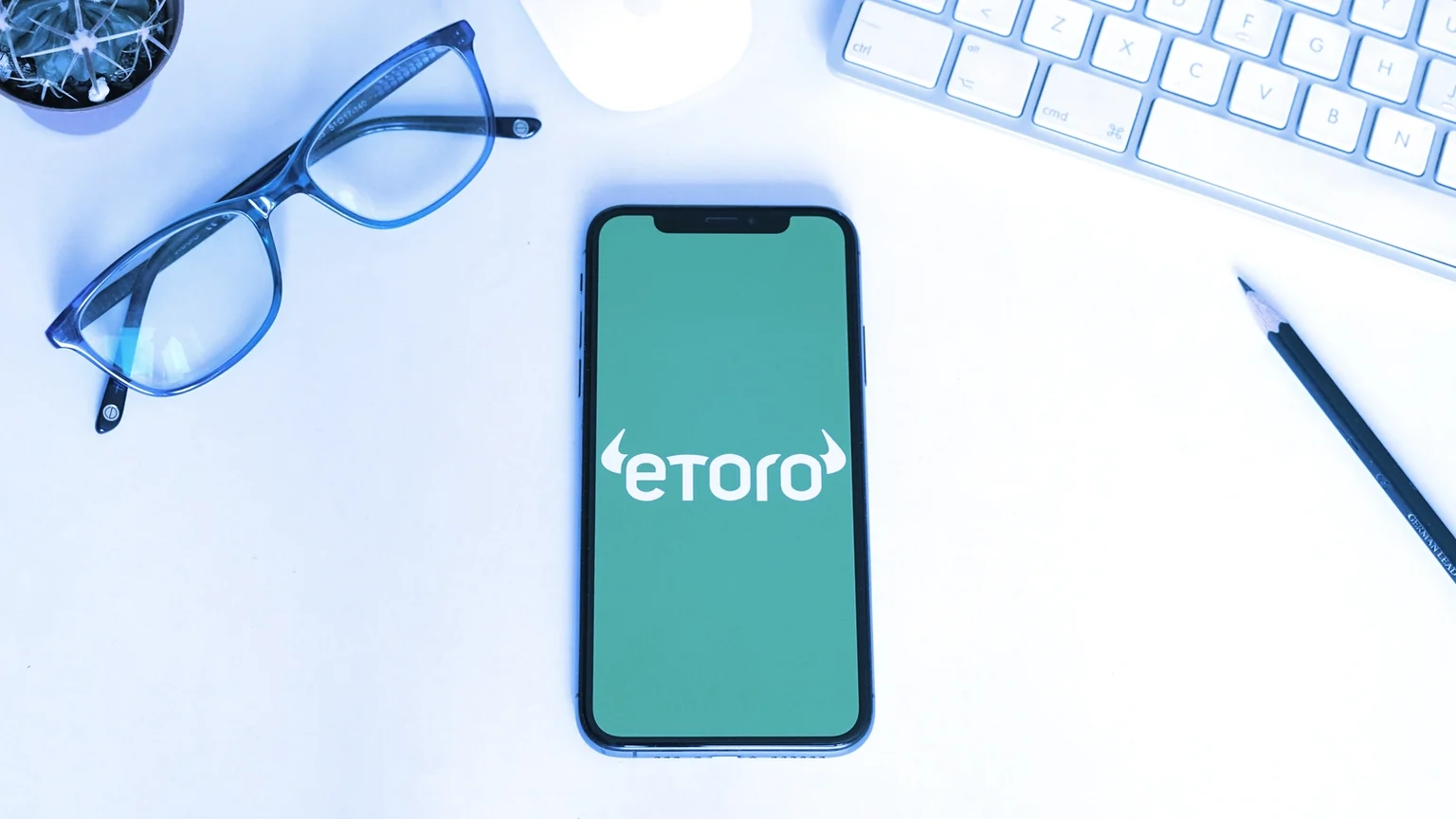 eToro is a trading platform that lets investors buy stocks and cryptocurrencies. Image: Shutterstock