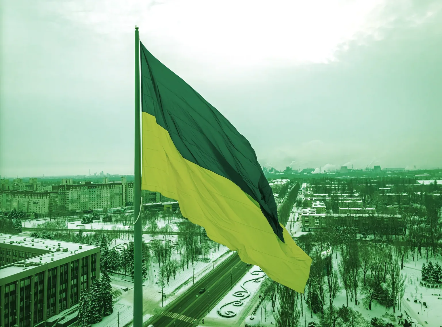 Aerial view of the Ukraine flag in winter. (Shutterstock)