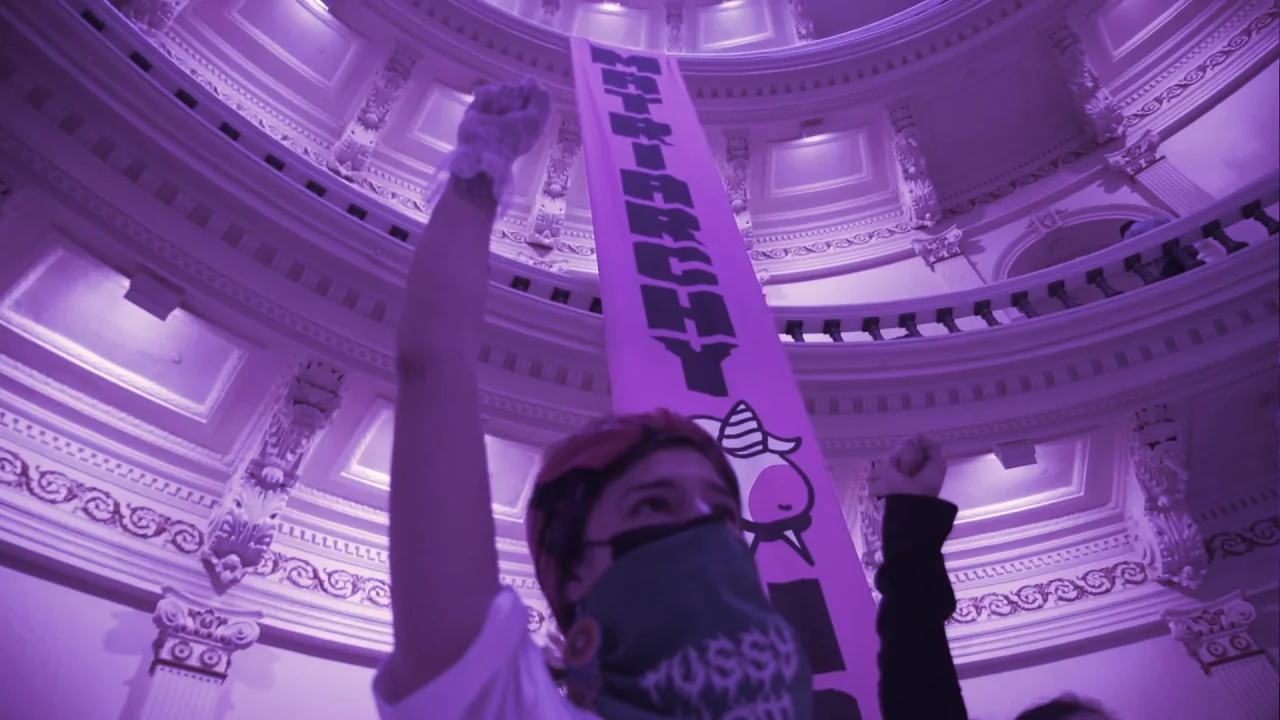 A protestor in the Texas State Capitol. Image: Pussy Riot x Ikiya x Unicorn DAO