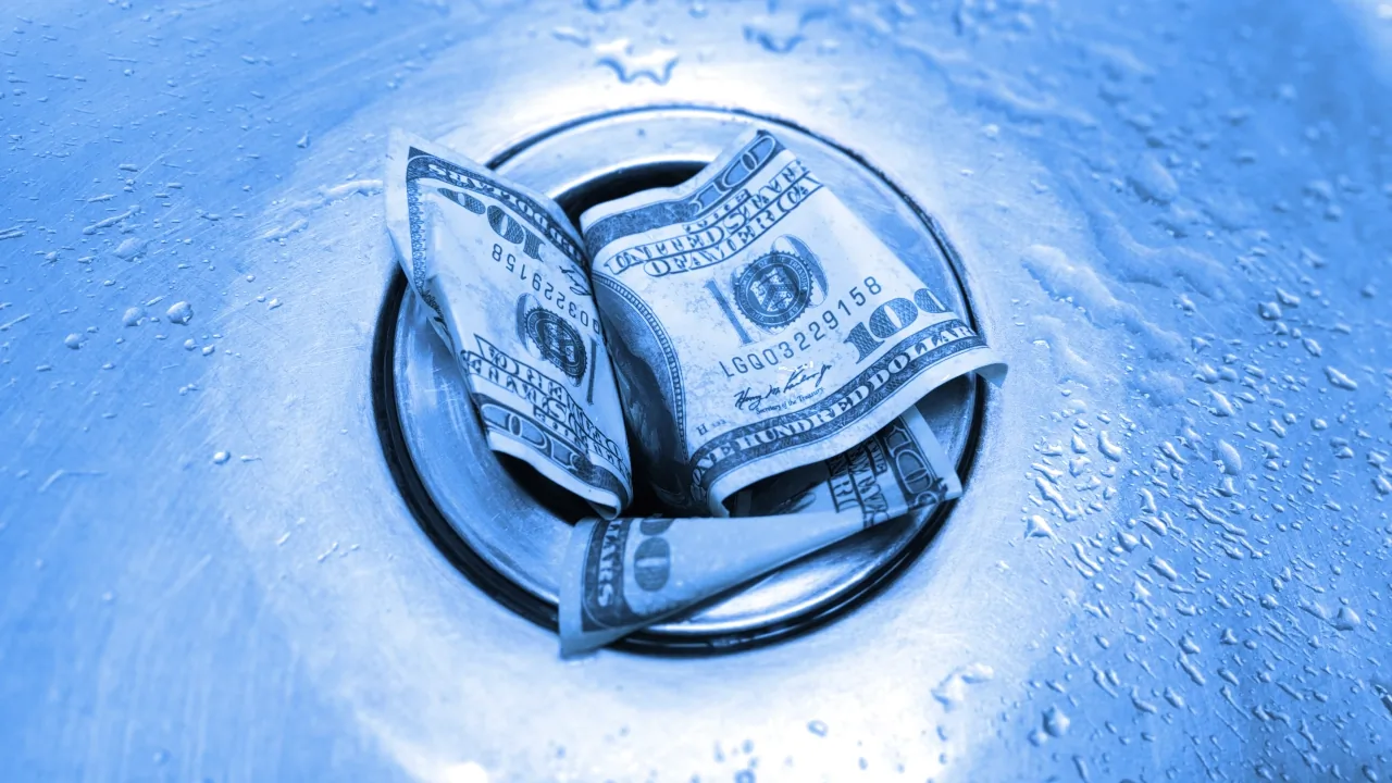 Money down the drain. Image: Shutterstock