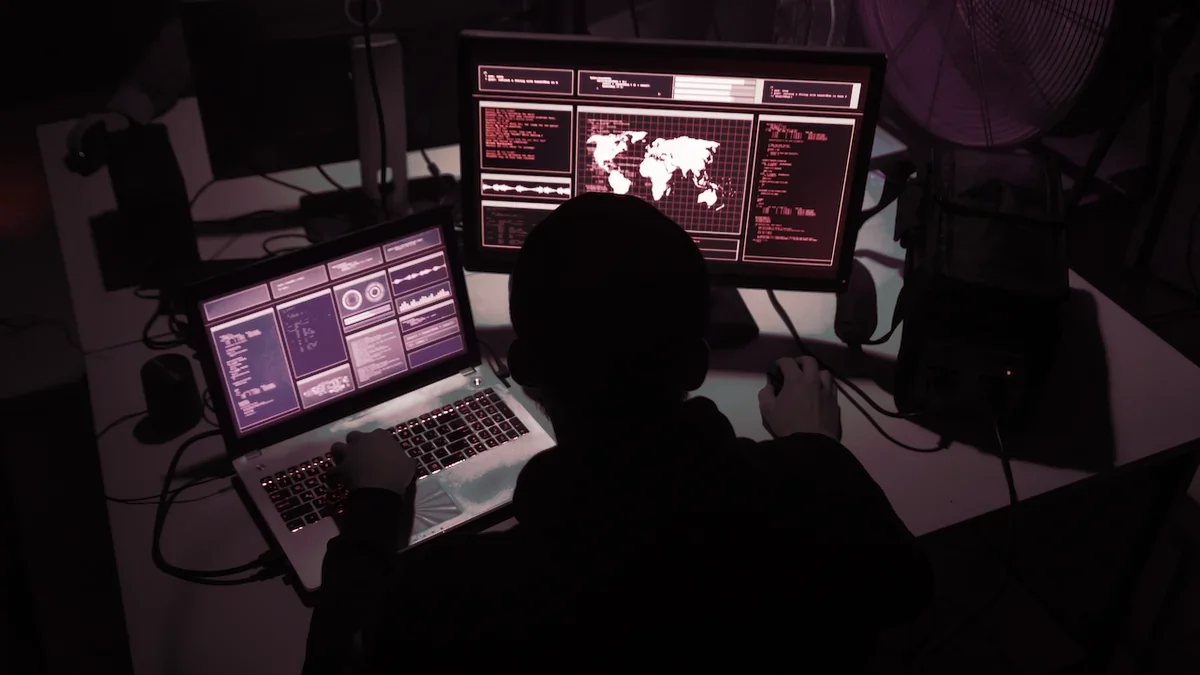 A shadowy super coder at work. Image: Shutterstock